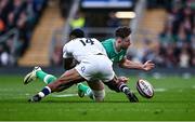 9 March 2024; Hugo Keenan of Ireland is tackled by Immanuel Feyi-Waboso of England during the Guinness Six Nations Rugby Championship match between England and Ireland at Twickenham Stadium in London, England. Photo by Harry Murphy/Sportsfile