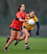 9 March 2024; Aine O'Neill of UCC in action against Clodagh Lohan of DCU Dochas Éireann during the 2024 Ladies HEC O’Connor Cup final match between Dublin City University Dóchas Éireann and University College Cork at MTU Cork. Photo by Brendan Moran/Sportsfile