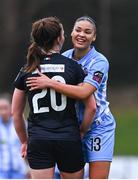 9 March 2024; Neema Nyangasi of DLR Waves and Scarlett Herron of Shamrock Rovers embrace after the SSE Airtricity Women's Premier Division match between DLR Waves and Shamrock Rovers at UCD Bowl in Belfield, Dublin. Photo by Tyler Miller/Sportsfile