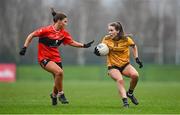 9 March 2024; Roisin Ennis of DCU Dochas Éireann in action against Ellie Jack of UCC during the 2024 Ladies HEC O’Connor Cup final match between Dublin City University Dóchas Éireann and University College Cork at MTU Cork. Photo by Brendan Moran/Sportsfile