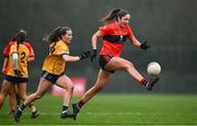 9 March 2024; Mary O'Connell of UCC in action against Roisin Ennis of DCU Dochas Éireann during the 2024 Ladies HEC O’Connor Cup final match between Dublin City University Dóchas Éireann and University College Cork at MTU Cork. Photo by Brendan Moran/Sportsfile