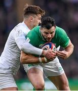 9 March 2024; Robbie Henshaw of Ireland is tackled by Henry Slade of England during the Guinness Six Nations Rugby Championship match between England and Ireland at Twickenham Stadium in London, England. Photo by David Fitzgerald/Sportsfile