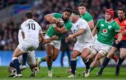 9 March 2024; Bundee Aki of Ireland is tackled by George Ford and Jamie George of England during the Guinness Six Nations Rugby Championship match between England and Ireland at Twickenham Stadium in London, England. Photo by David Fitzgerald/Sportsfile
