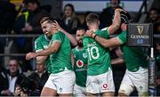 9 March 2024; James Lowe of Ireland celebrates with teammates after scoring their side's first try, in the 44th minute, during the Guinness Six Nations Rugby Championship match between England and Ireland at Twickenham Stadium in London, England. Photo by Harry Murphy/Sportsfile
