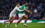 9 March 2024; Bundee Aki of Ireland is tackled by Henry Slade of England during the Guinness Six Nations Rugby Championship match between England and Ireland at Twickenham Stadium in London, England. Photo by David Fitzgerald/Sportsfile