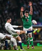 9 March 2024; Alex Mitchell of England clears under pressure from Joe McCarthy of Ireland during the Guinness Six Nations Rugby Championship match between England and Ireland at Twickenham Stadium in London, England. Photo by Harry Murphy/Sportsfile