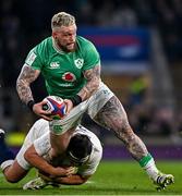 9 March 2024; Andrew Porter of Ireland is tackled by Jamie George of England during the Guinness Six Nations Rugby Championship match between England and Ireland at Twickenham Stadium in London, England. Photo by Harry Murphy/Sportsfile