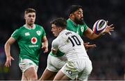 9 March 2024; Bundee Aki of Ireland is tackled by George Ford of England during the Guinness Six Nations Rugby Championship match between England and Ireland at Twickenham Stadium in London, England. Photo by Harry Murphy/Sportsfile