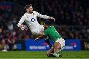 9 March 2024; Elliot Daly of England is tackled by Bundee Aki of Ireland during the Guinness Six Nations Rugby Championship match between England and Ireland at Twickenham Stadium in London, England. Photo by David Fitzgerald/Sportsfile