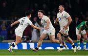 9 March 2024; England players, from left, Marcus Smith, Theo Dan and Ben Earl celebrate at the final whistle of the Guinness Six Nations Rugby Championship match between England and Ireland at Twickenham Stadium in London, England. Photo by David Fitzgerald/Sportsfile