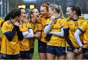 9 March 2024; The DCU Dochas Éireann players Tara Needham, Kate Kenny, centre, and Emma Morrissey celebrate after the 2024 Ladies HEC O’Connor Cup final match between Dublin City University Dóchas Éireann and University College Cork at MTU Cork. Photo by Brendan Moran/Sportsfile