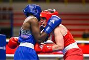 9 March 2024; Grainne Walsh of Ireland, right, in action against Asiko Friza Anyango of Kenya during their Women's 66kg Round of 16 bout during day seven at the Paris 2024 Olympic Boxing Qualification Tournament at E-Work Arena in Busto Arsizio, Italy. Photo by Ben McShane/Sportsfile