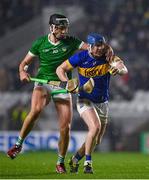 9 March 2024; Alan Tynan of Tipperary in action against Gearoid Hegarty of Limerick during the Allianz Hurling League Division 1 Group B match between Limerick and Tipperary at SuperValu Páirc Uí Chaoimh in Cork. Photo by Seb Daly/Sportsfile