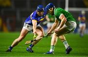 9 March 2024; Jason Forde of Tipperary in action against Mike Casey of Limerick during the Allianz Hurling League Division 1 Group B match between Limerick and Tipperary at SuperValu Páirc Uí Chaoimh in Cork. Photo by Seb Daly/Sportsfile