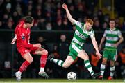 9 March 2024; Rory Gaffney of Shamrock Rovers in action against Nando Pijnaker of Sligo Rovers during the SSE Airtricity Men's Premier Division match between Sligo Rovers and Shamrock Rovers at The Showgrounds in Sligo. Photo by Stephen McCarthy/Sportsfile
