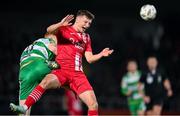 9 March 2024; John Ross Wilson of Sligo Rovers in action against Rory Gaffney of Shamrock Rovers during the SSE Airtricity Men's Premier Division match between Sligo Rovers and Shamrock Rovers at The Showgrounds in Sligo. Photo by Stephen McCarthy/Sportsfile