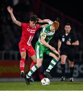 9 March 2024; Rory Gaffney of Shamrock Rovers in action against Niall Morahan of Sligo Rovers during the SSE Airtricity Men's Premier Division match between Sligo Rovers and Shamrock Rovers at The Showgrounds in Sligo. Photo by Stephen McCarthy/Sportsfile