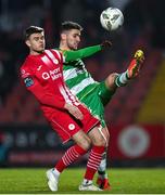 9 March 2024; Dylan Watts of Shamrock Rovers in action against Fabrice Hartmann of Sligo Rovers during the SSE Airtricity Men's Premier Division match between Sligo Rovers and Shamrock Rovers at The Showgrounds in Sligo. Photo by Stephen McCarthy/Sportsfile