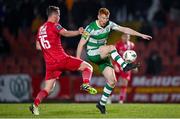 9 March 2024; Rory Gaffney of Shamrock Rovers in action against Ollie Denham of Sligo Rovers during the SSE Airtricity Men's Premier Division match between Sligo Rovers and Shamrock Rovers at The Showgrounds in Sligo. Photo by Stephen McCarthy/Sportsfile