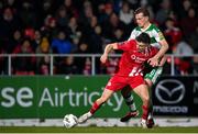 9 March 2024; Simon Power of Sligo Rovers is tackled by Daniel Cleary of Shamrock Rovers during the SSE Airtricity Men's Premier Division match between Sligo Rovers and Shamrock Rovers at The Showgrounds in Sligo. Photo by Stephen McCarthy/Sportsfile
