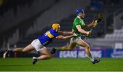 9 March 2024; Mike Casey of Limerick in action against Conor Stakelum of Tipperary during the Allianz Hurling League Division 1 Group B match between Limerick and Tipperary at SuperValu Páirc Uí Chaoimh in Cork. Photo by Seb Daly/Sportsfile