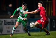 9 March 2024; Darragh Burns of Shamrock Rovers in action against Simon Power of Sligo Rovers during the SSE Airtricity Men's Premier Division match between Sligo Rovers and Shamrock Rovers at The Showgrounds in Sligo. Photo by Stephen McCarthy/Sportsfile
