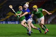 9 March 2024; Craig Morgan of Tipperary in action against Adam English, left, and Seamus Flanagan of Limerick  during the Allianz Hurling League Division 1 Group B match between Limerick and Tipperary at SuperValu Páirc Uí Chaoimh in Cork. Photo by Seb Daly/Sportsfile