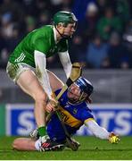 9 March 2024; Conor Bowe of Tipperary in action against William O’Donoghue of Limerick during the Allianz Hurling League Division 1 Group B match between Limerick and Tipperary at SuperValu Páirc Uí Chaoimh in Cork. Photo by Seb Daly/Sportsfile