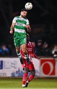 9 March 2024; Roberto Lopes of Shamrock Rovers in action against Wilson Waweru of Sligo Rovers during the SSE Airtricity Men's Premier Division match between Sligo Rovers and Shamrock Rovers at The Showgrounds in Sligo. Photo by Stephen McCarthy/Sportsfile
