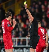 9 March 2024; Nando Pijnaker of Sligo Rovers is shown a yellow card by referee Rob Hennessy during the SSE Airtricity Men's Premier Division match between Sligo Rovers and Shamrock Rovers at The Showgrounds in Sligo. Photo by Stephen McCarthy/Sportsfile