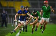 9 March 2024; Alan Tynan of Tipperary in action against Barry Murphy of Limerick during the Allianz Hurling League Division 1 Group B match between Limerick and Tipperary at SuperValu Páirc Uí Chaoimh in Cork. Photo by Seb Daly/Sportsfile