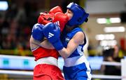 10 March 2024; Daina Moorehouse of Ireland, left, in action against Sabrina Bobokulva of Uzbekistan during their Women's 50kg Round of 16 bout during day eight at the Paris 2024 Olympic Boxing Qualification Tournament at E-Work Arena in Busto Arsizio, Italy. Photo by Ben McShane/Sportsfile
