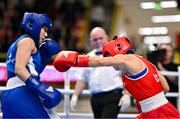 10 March 2024; Daina Moorehouse of Ireland, right, in action against Sabrina Bobokulva of Uzbekistan during their Women's 50kg Round of 16 bout during day eight at the Paris 2024 Olympic Boxing Qualification Tournament at E-Work Arena in Busto Arsizio, Italy. Photo by Ben McShane/Sportsfile