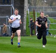10 March 2024; David McInerney, left, and Shane O'Donnell of Clare during a training excercise before the Allianz Hurling League Division 1 Group A match between Clare and Kilkenny at Cusack Park in Ennis, Clare. Photo by Ray McManus/Sportsfile