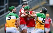 10 March 2024; Seamus Harnedy of Cork is tackled by Ben Coneely, left, and Cathal King of Offaly during the Allianz Hurling League Division 1 Group A match between Offaly and Cork at Glenisk O'Connor Park in Tullamore, Offaly. Photo by Tyler Miller/Sportsfile