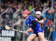 10 March 2024; John Conlon of Clare is tackled by Cian Kenny of Kilkenny during the Allianz Hurling League Division 1 Group A match between Clare and Kilkenny at Cusack Park in Ennis, Clare. Photo by John Sheridan/Sportsfile