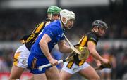 10 March 2024; Keith Smith of Clare is tackled by Tommy Walsh of Kilkenny during the Allianz Hurling League Division 1 Group A match between Clare and Kilkenny at Cusack Park in Ennis, Clare. Photo by Ray McManus/Sportsfile