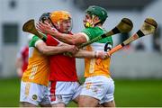 10 March 2024; Shane Barrett of Cork is tackled by David King, right, and Cathal King of Offaly during the Allianz Hurling League Division 1 Group A match between Offaly and Cork at Glenisk O'Connor Park in Tullamore, Offaly. Photo by Tyler Miller/Sportsfile