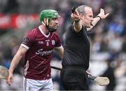 10 March 2024; Referee Johnny Murphy signals for a Dublin penalty as David Burke of Galway appeals during the Allianz Hurling League Division 1 Group B match between Galway v Dublin at Pearse Stadium in Galway. Photo by Piaras Ó Mídheach/Sportsfile