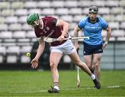 10 March 2024; Adrian Tuohy of Galway passes under pressure from Cian O'Sullivan of Dublin during the Allianz Hurling League Division 1 Group B match between Galway v Dublin at Pearse Stadium in Galway. Photo by Piaras Ó Mídheach/Sportsfile