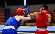 10 March 2024; Rogen Ladon of Philipines, right, in action against Kiaran MacDonald of Great Britain during their Men's 51kg Round of 16 bout during day eight at the Paris 2024 Olympic Boxing Qualification Tournament at E-Work Arena in Busto Arsizio, Italy. Photo by Ben McShane/Sportsfile