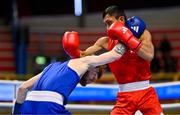 10 March 2024; Rogen Ladon of Philipines, right, in action against Kiaran MacDonald of Great Britain during their Men's 51kg Round of 16 bout during day eight at the Paris 2024 Olympic Boxing Qualification Tournament at E-Work Arena in Busto Arsizio, Italy. Photo by Ben McShane/Sportsfile
