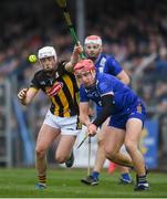 10 March 2024; John Conlon of Clare is tackled by Cian Kenny of Kilkenny during the Allianz Hurling League Division 1 Group A match between Clare and Kilkenny at Cusack Park in Ennis, Clare. Photo by John Sheridan/Sportsfile