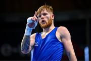10 March 2024; Kiaran MacDonald of Great Britain celebrates after winning their Men's 51kg Round of 16 bout against Rogen Ladon of Philipines during day eight at the Paris 2024 Olympic Boxing Qualification Tournament at E-Work Arena in Busto Arsizio, Italy. Photo by Ben McShane/Sportsfile