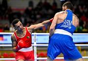 10 March 2024; Kelyn Cassidy of Ireland, left, in action against Rafayel Hovhannisyan of Armenia during their Men's 80kg Round of 16 bout during day eight at the Paris 2024 Olympic Boxing Qualification Tournament at E-Work Arena in Busto Arsizio, Italy. Photo by Ben McShane/Sportsfile