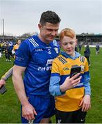 10 March 2024; Paul Flanagan of Clare poses for a selfie with a Clare supporter after the Allianz Hurling League Division 1 Group A match between Clare and Kilkenny at Cusack Park in Ennis, Clare. Photo by Ray McManus/Sportsfile