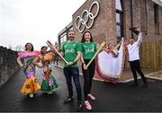 12 March 2024; In attendance at the announcement of Team Ireland and PTSB sponsorship of the St Patrick's Day Festival is Olympic medallist in boxing, Kenneth Egan and Olympic medallist in sailing, Annalise Murphy with dancers, from left, Jagna Jiglioly, Janet Justiniani, Narviz Narvaez and Pablo Rojas at the Olympic House Sport Ireland Campus in Dublin. Photo by David Fitzgerald/Sportsfile