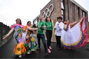 12 March 2024; In attendance at the announcement of Team Ireland and PTSB sponsorship of the St Patrick's Day Festival is Olympic medallist in boxing, Kenneth Egan and Olympic medallist in sailing, Annalise Murphy with dancers, from left, Jagna Jiglioly, Janet Justiniani, Pablo Rojas and Narviz Narvaez at the Olympic House Sport Ireland Campus in Dublin. Photo by David Fitzgerald/Sportsfile