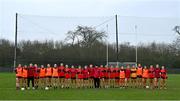 9 March 2024; The UCC team stand for the national anthem before the 2024 Ladies HEC Lynch Cup final match between Munster Technological University Cork and University College Cork at MTU Cork. Photo by Brendan Moran/Sportsfile