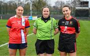 9 March 2024; Referee Sinead McHugh with team captains Ellen Maguire of MTU Cork, left, and Mairead Bennett of UCC before the 2024 Ladies HEC Lynch Cup final match between Munster Technological University Cork and University College Cork at MTU Cork. Photo by Brendan Moran/Sportsfile